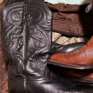 Black Cowboy Boots with Intricate Stitching and Mid-Calf Height